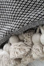 Pom Pom Blanket - white and black pattern